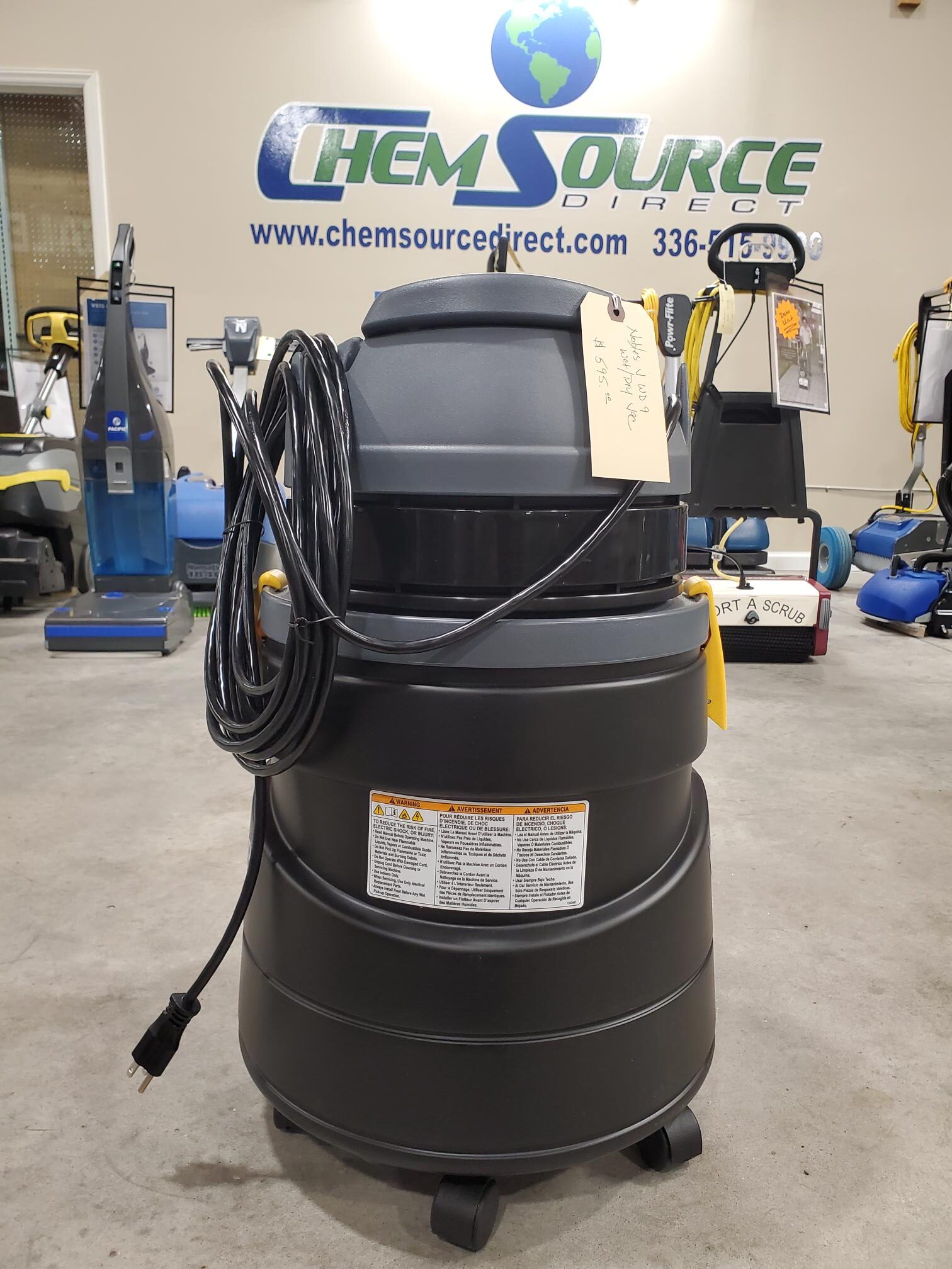 A Nobles V-WD-9 Wet/Dry Vacuum NEW in a warehouse.