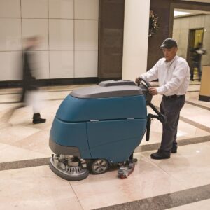 man cleaning floor