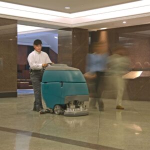 man cleaning floor