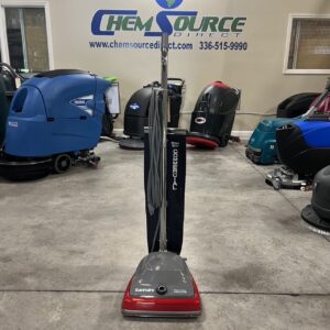 A Sanitaire Upright Vacuum cleaner in a warehouse.