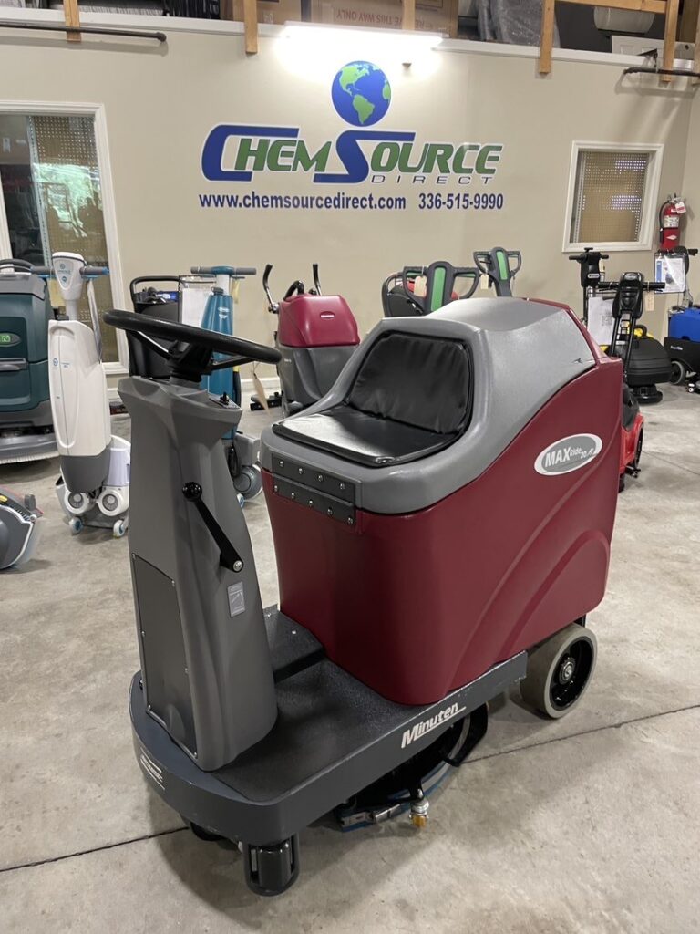 A REFURBISHED Minuteman Max Ride 20 Ride On Auto Scrubber on display in a showroom.