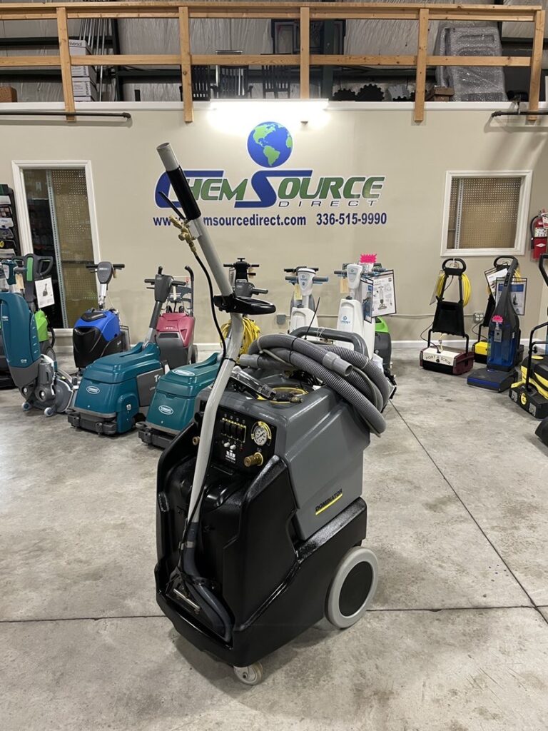 A Karcher Dominator Puzzi 50 35 Heated Carpet Extractor in a warehouse showroom.