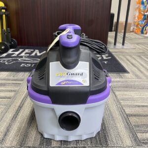 A ProTeam ProGuard Wet/Dry Vacuum on a showroom floor.