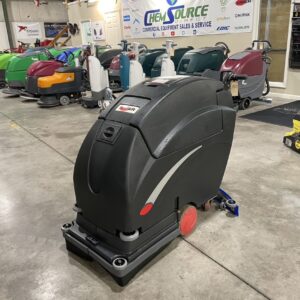 A Viper Fang 20HD battery-powered floor scrubber in a warehouse showroom.