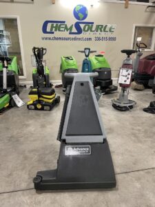 An Advance Carpetriever 28 Wide Area Vacuum Cleaner in a warehouse showroom.