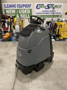 A Windsor Chariot 2 iVac 24 ATV Stand On Vacuum in a warehouse showroom.