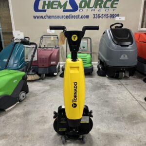 A Tornado Microburst 17" Compact Scrubber in a warehouse showroom.