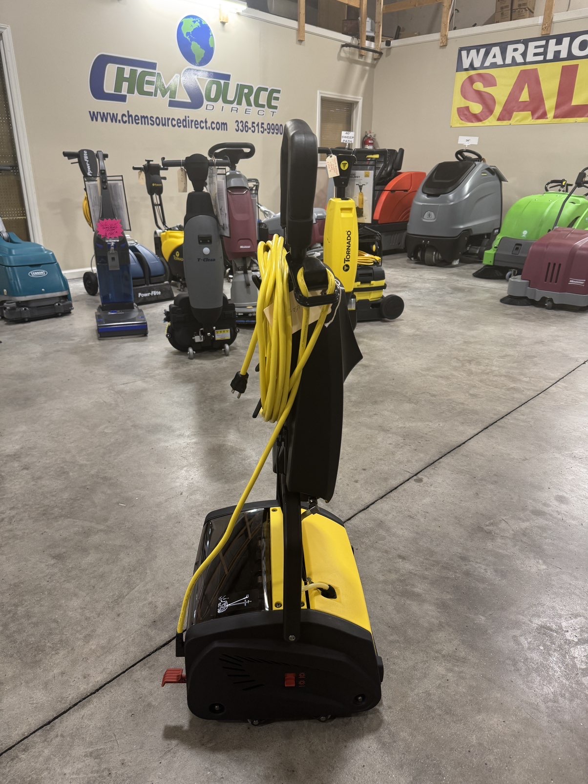 A Tornado Vortex 13 Multi-Surface Scrubber in a warehouse showroom.