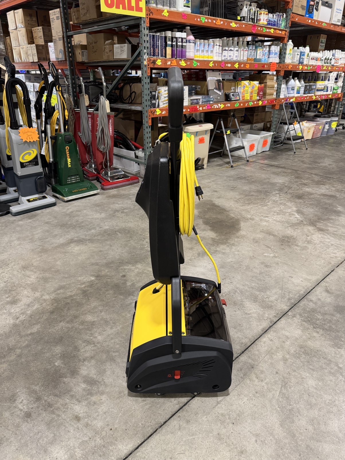 A Tornado Vortex 13 Multi-Surface Scrubber in a warehouse showroom.