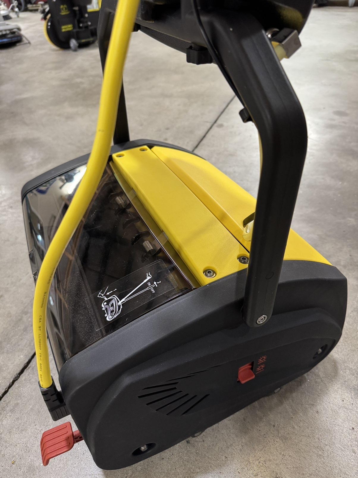 A Tornado Vortex 13 Multi-Surface Scrubber in a warehouse showroom.