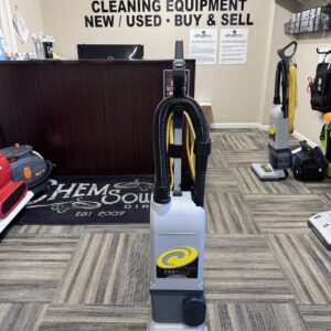 A ProTeam ProForce 1500XP Upright Vacuum Cleaner in a janitorial supplier showroom.