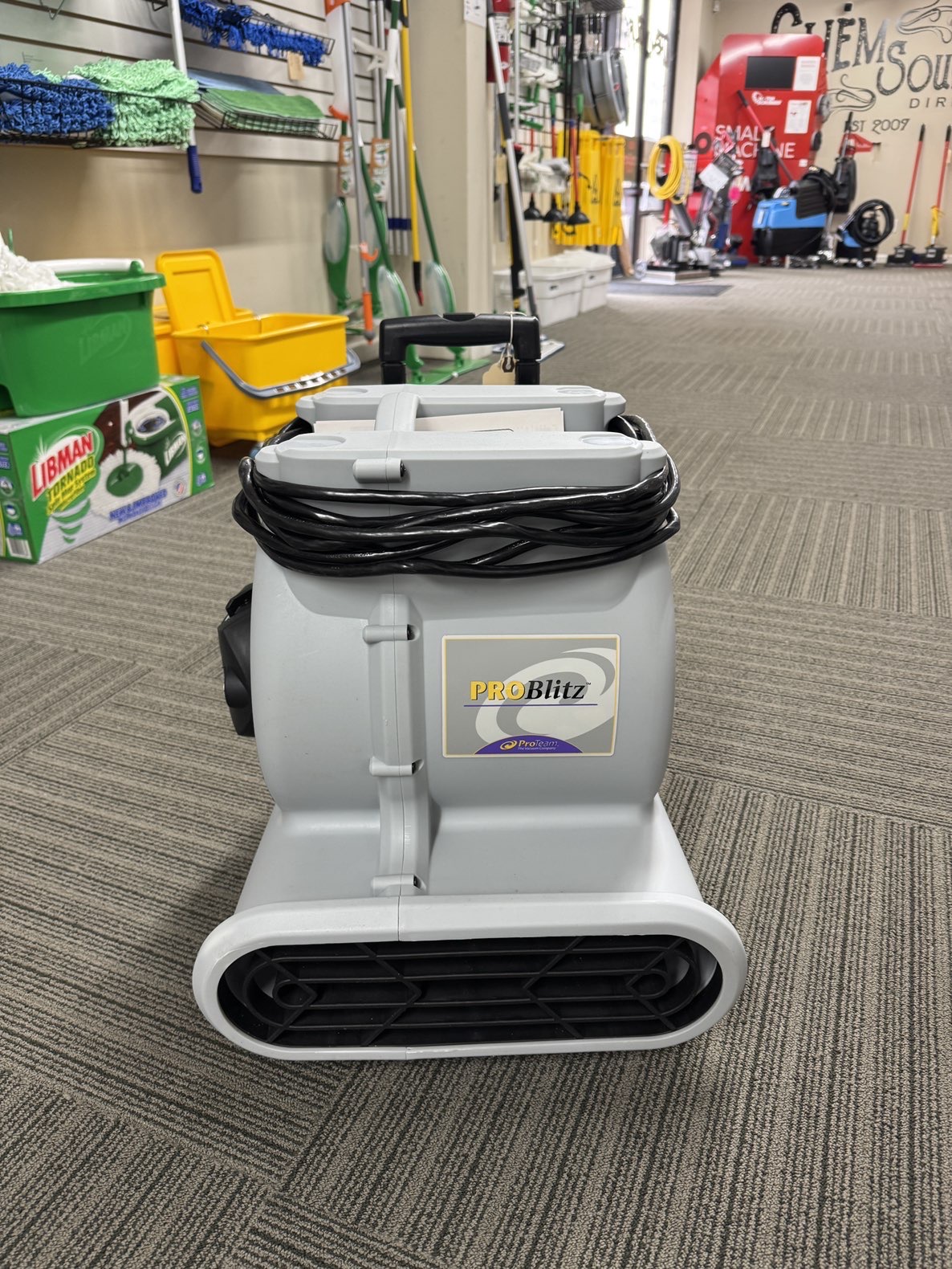 A ProTeam Air Mover XP in a warehouse showroom.