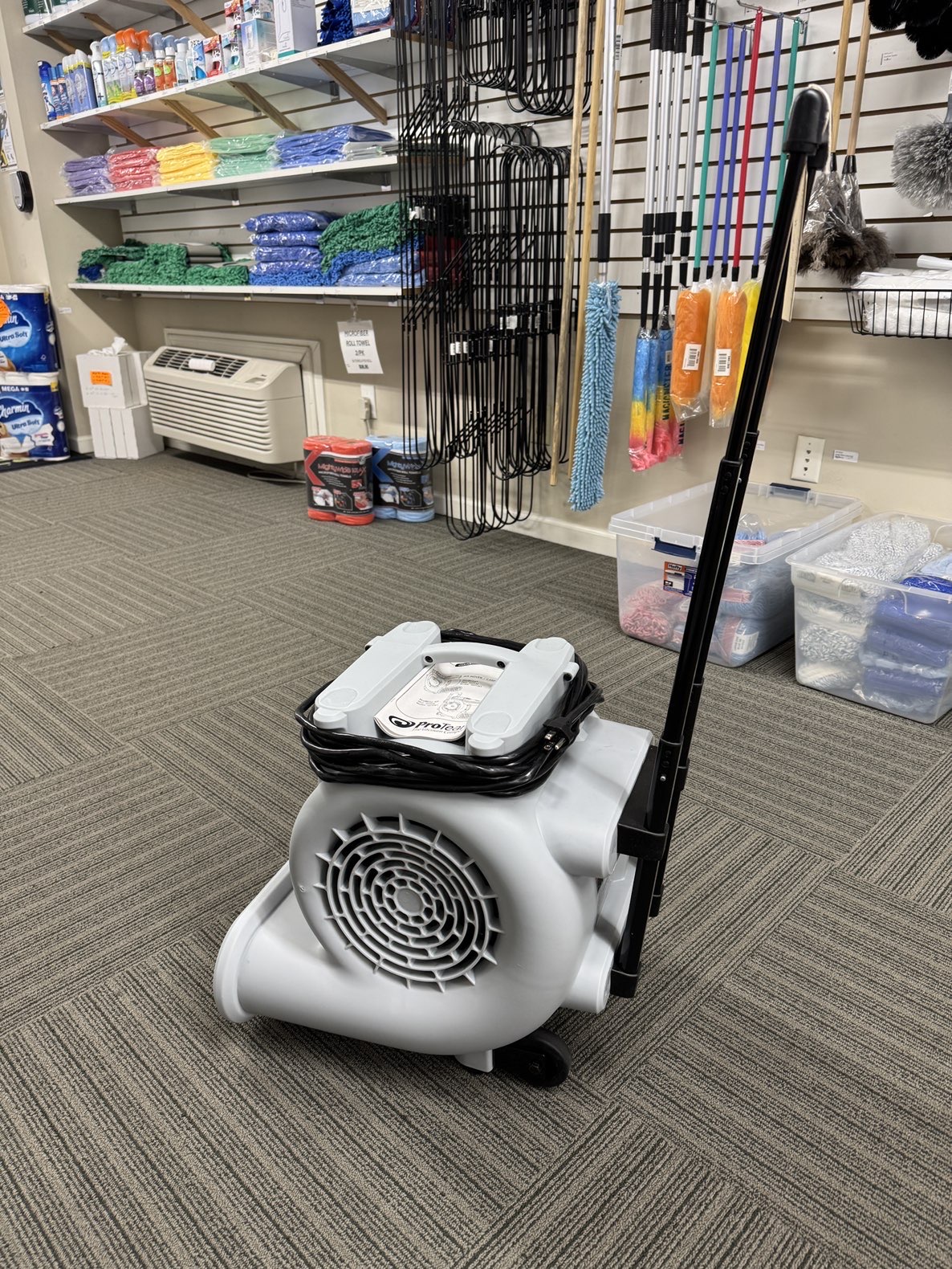 A ProTeam Air Mover XP in a warehouse showroom.