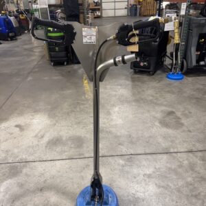 An EDIC Revolution Tile & Grout Tool in a warehouse showroom.