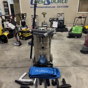 A High Reach Carbon Fiber Dusting Kit w/ Vacuum in a warehouse showroom at ChemSource Direct.