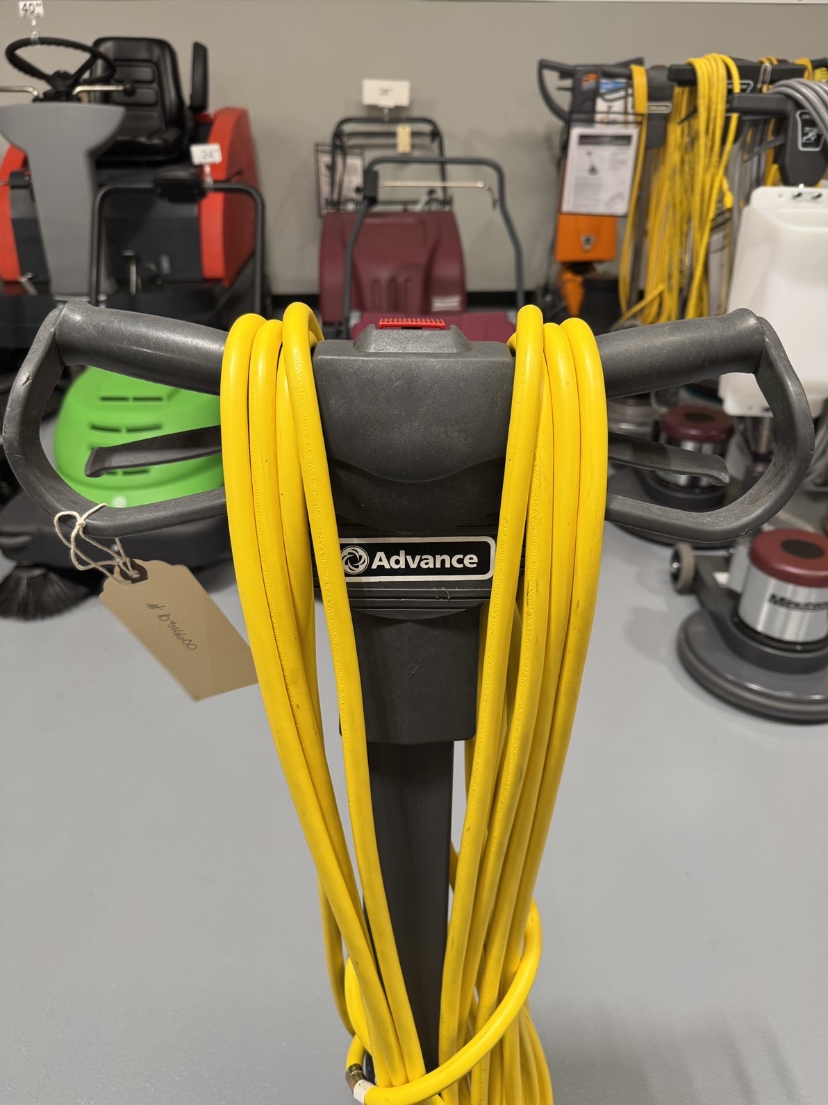 An Advance Advolution 20XP High-Speed Burnisher in a warehouse showroom at ChemSource Direct.