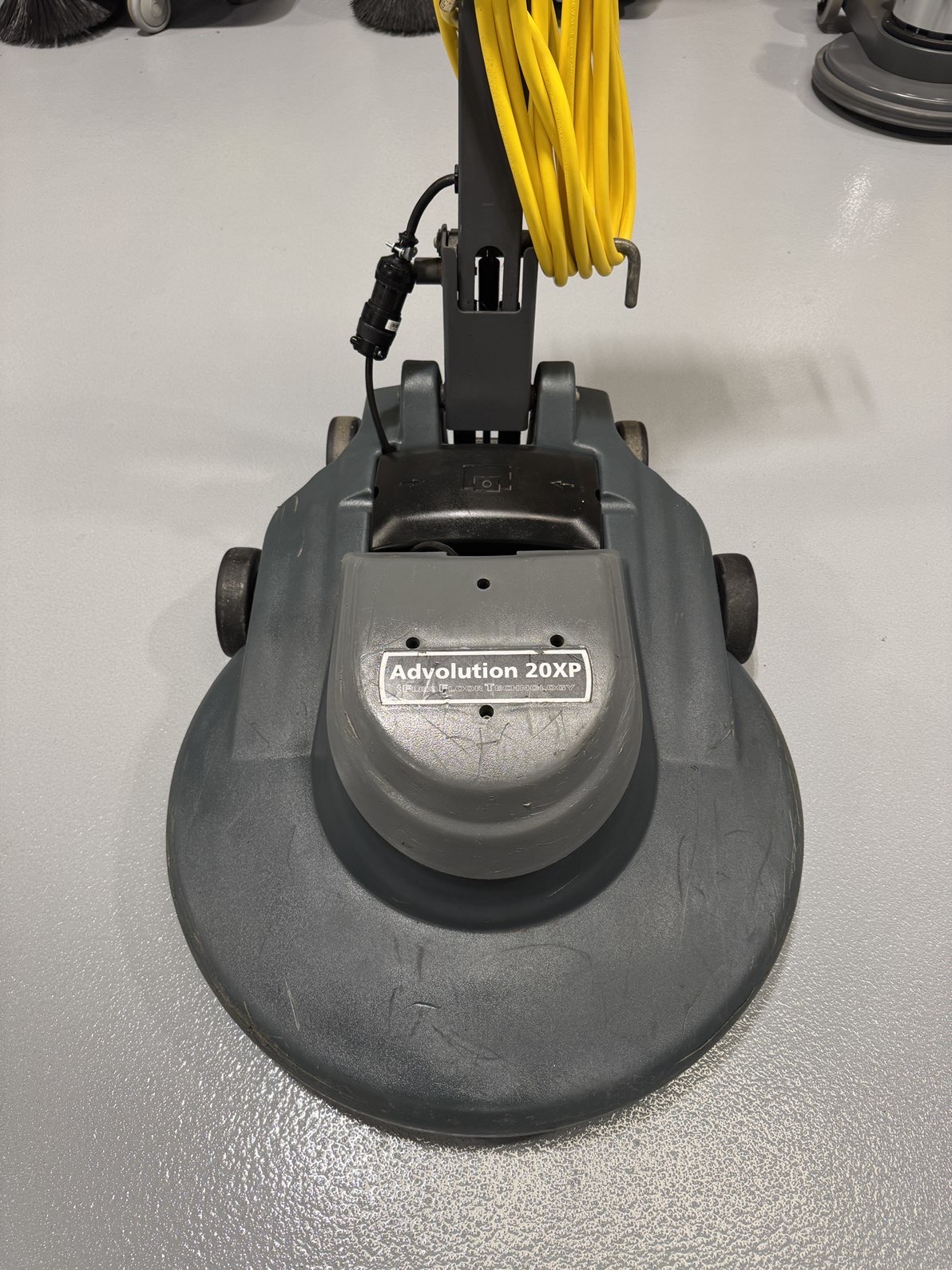 An Advance Advolution 20XP High-Speed Burnisher in a warehouse showroom at ChemSource Direct.