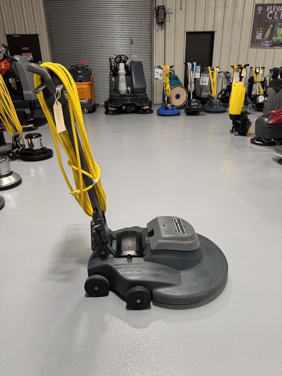 An Advance Advolution 20XP High-Speed Burnisher in a warehouse showroom at ChemSource Direct.