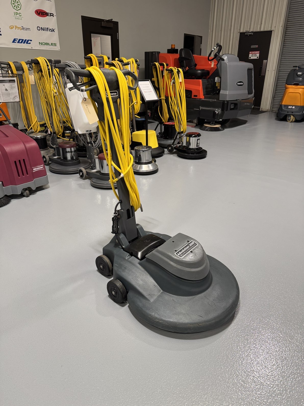 An Advance Advolution 20XP High-Speed Burnisher in a warehouse showroom at ChemSource Direct.