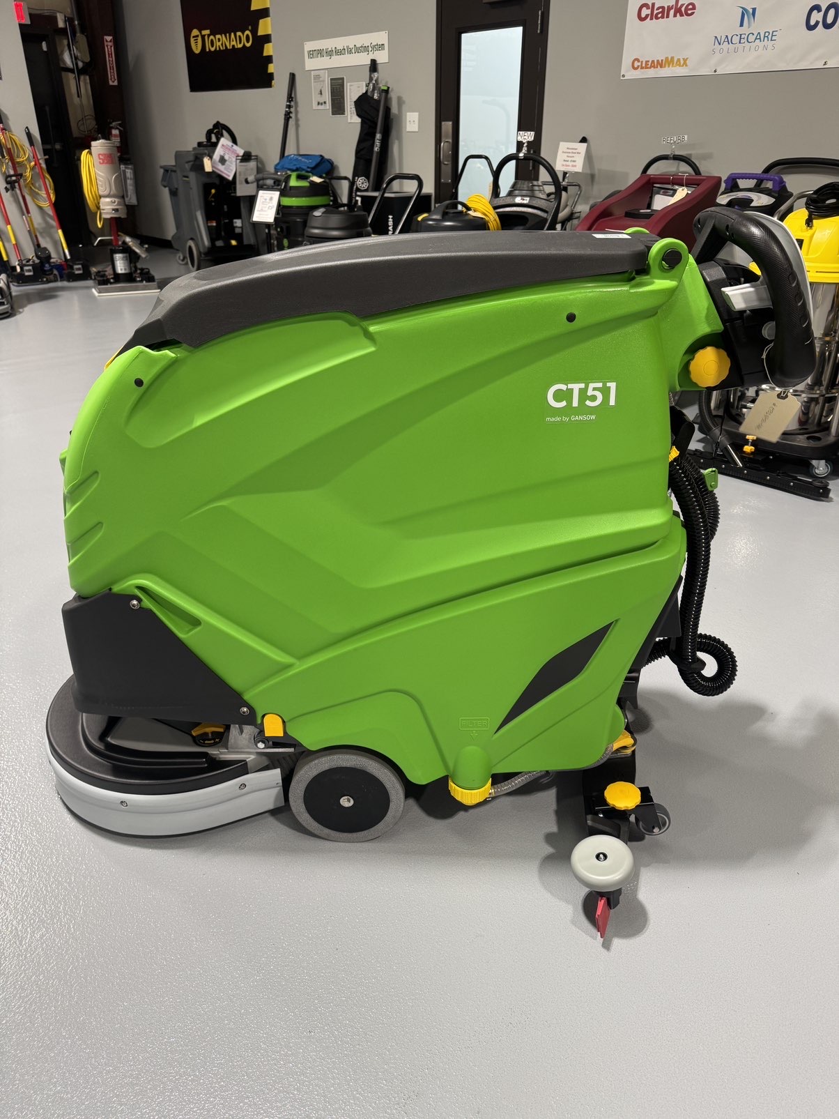 An IPC CT51 Walk-Behind Scrubber in a warehouse showroom at ChemSource Direct.