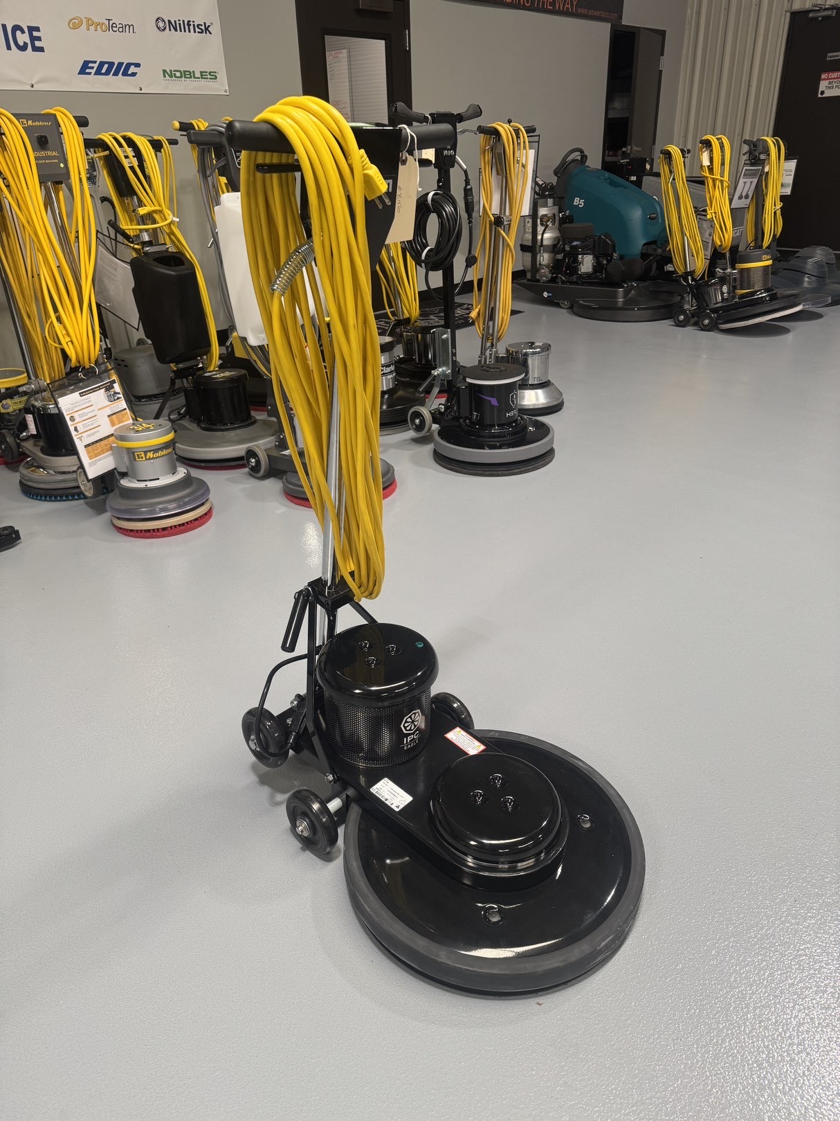 An IPC B1500 20" Burnisher in a warehouse showroom at ChemSource Direct.