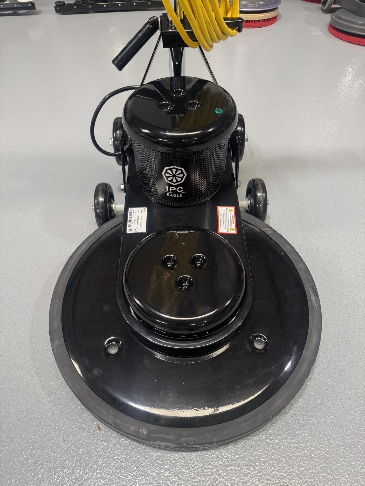 An IPC B1500 20" Burnisher in a warehouse showroom at ChemSource Direct.