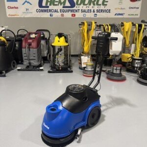 A Clarke MA50 15" Walk-Behind Scrubber in a warehouse showroom at ChemSource Direct.