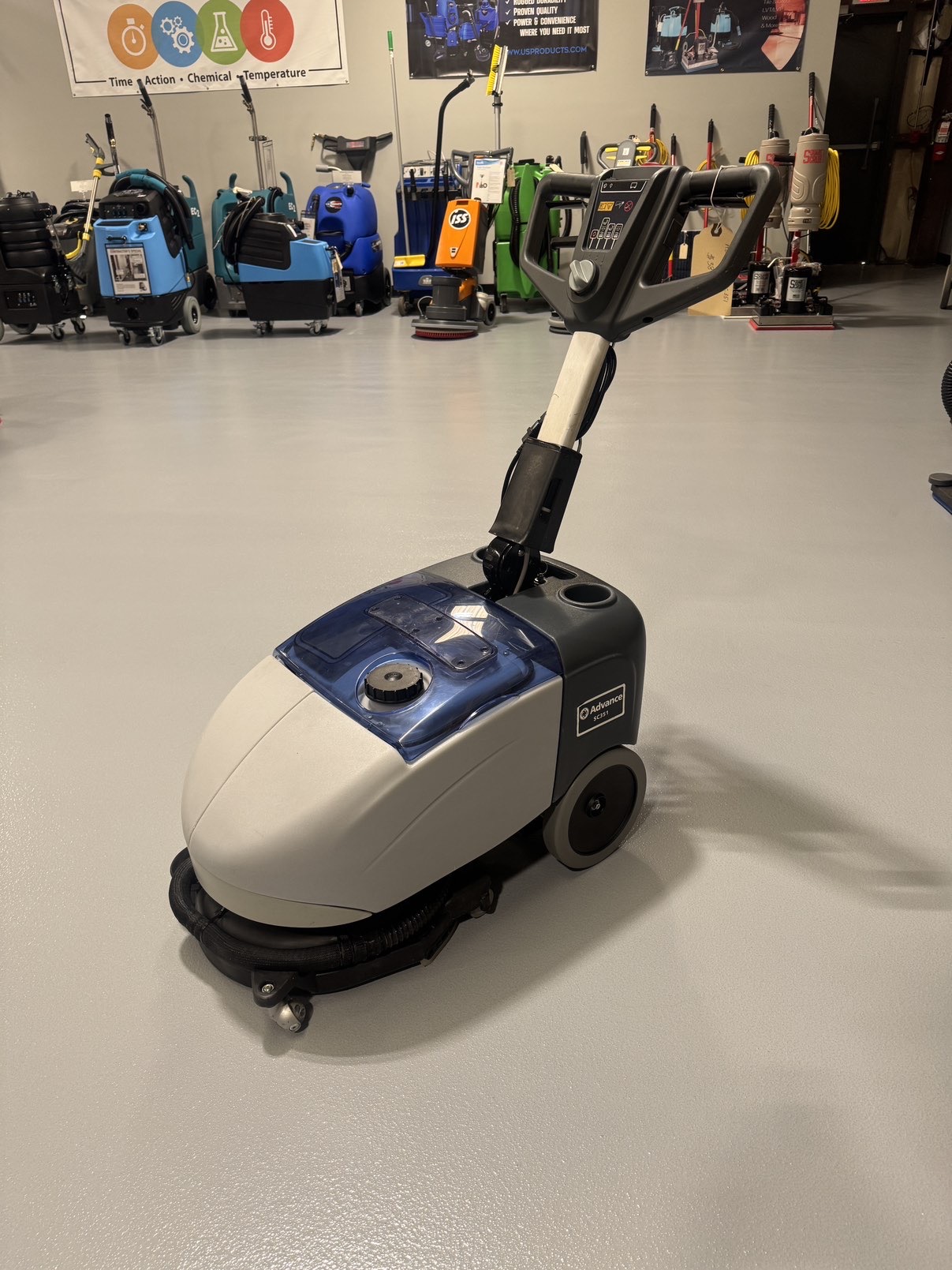 Advance SC351 Walk-Behind Scrubber in a warehouse showroom at ChemSource Direct.