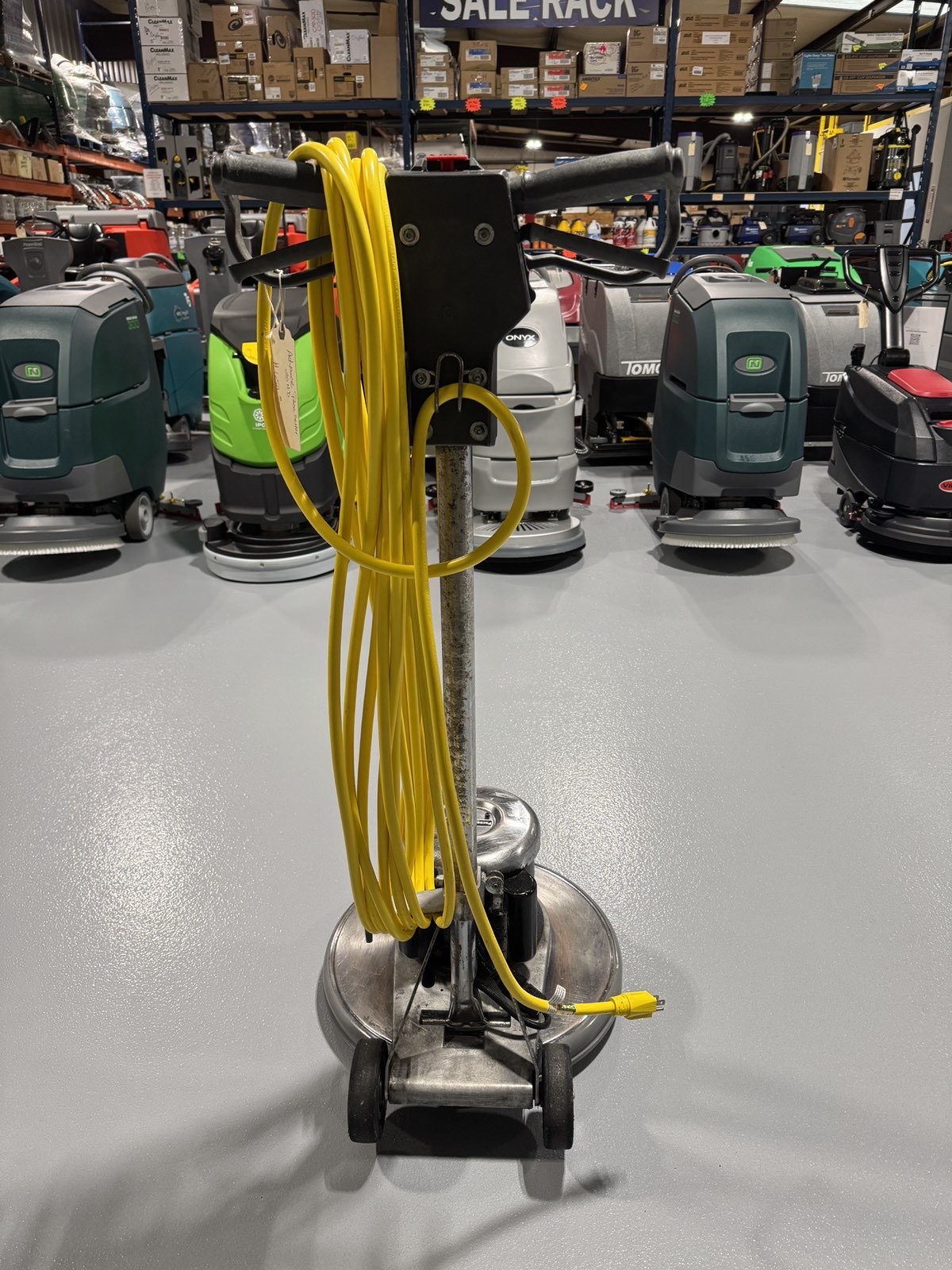 An Advance Pacesetter 20 HD Low-Speed Scrubber in a warehouse showroom at ChemSource Direct.