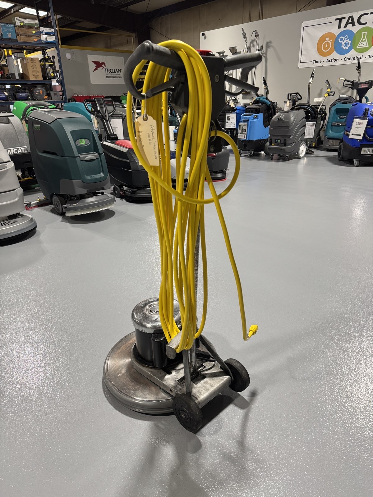 An Advance Pacesetter 20 HD Low-Speed Scrubber in a warehouse showroom at ChemSource Direct.