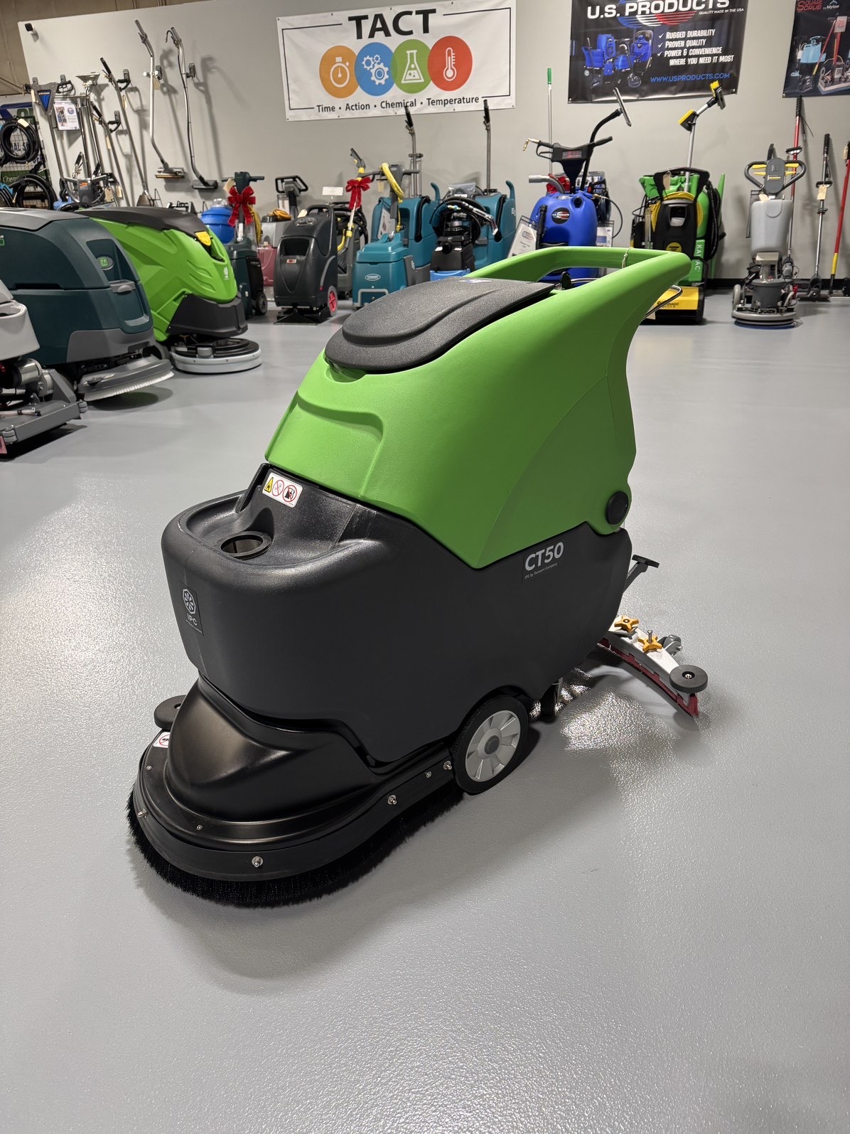 An IPC CT50 Walk-Behind Scrubber in a warehouse showroom at ChemSource Direct.