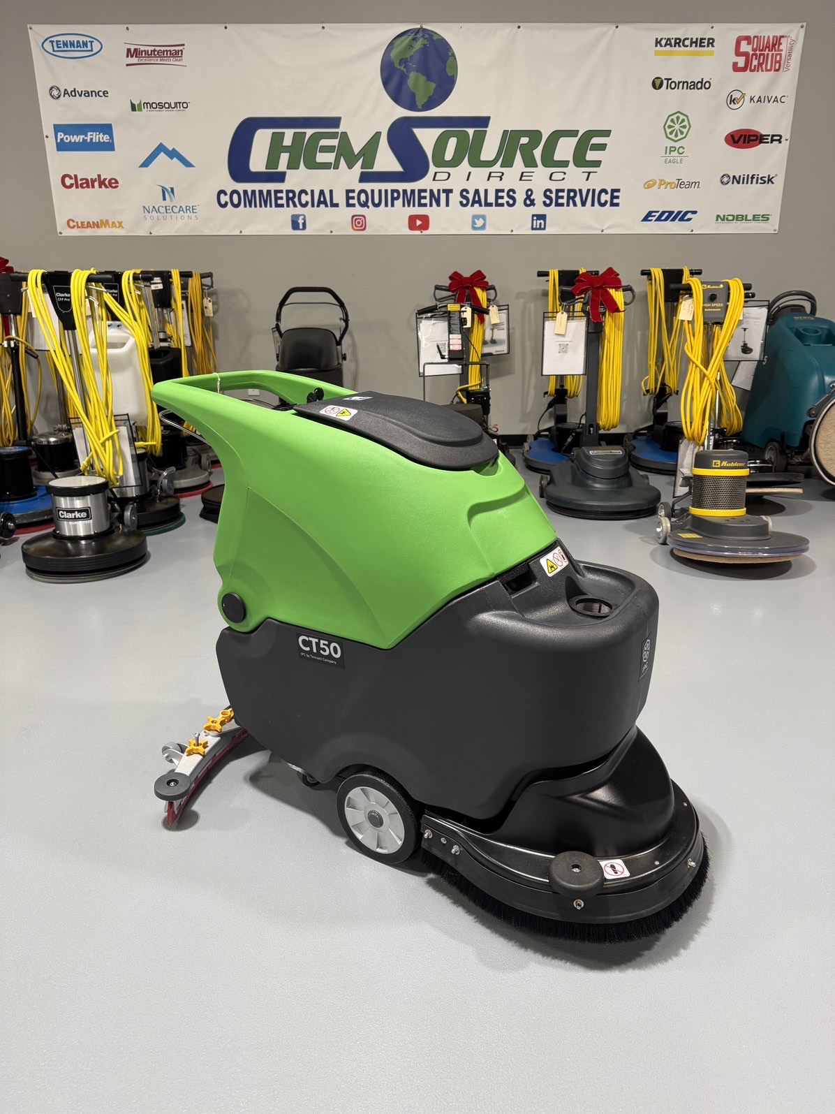 An IPC CT50 Walk-Behind Scrubber in a warehouse showroom at ChemSource Direct.
