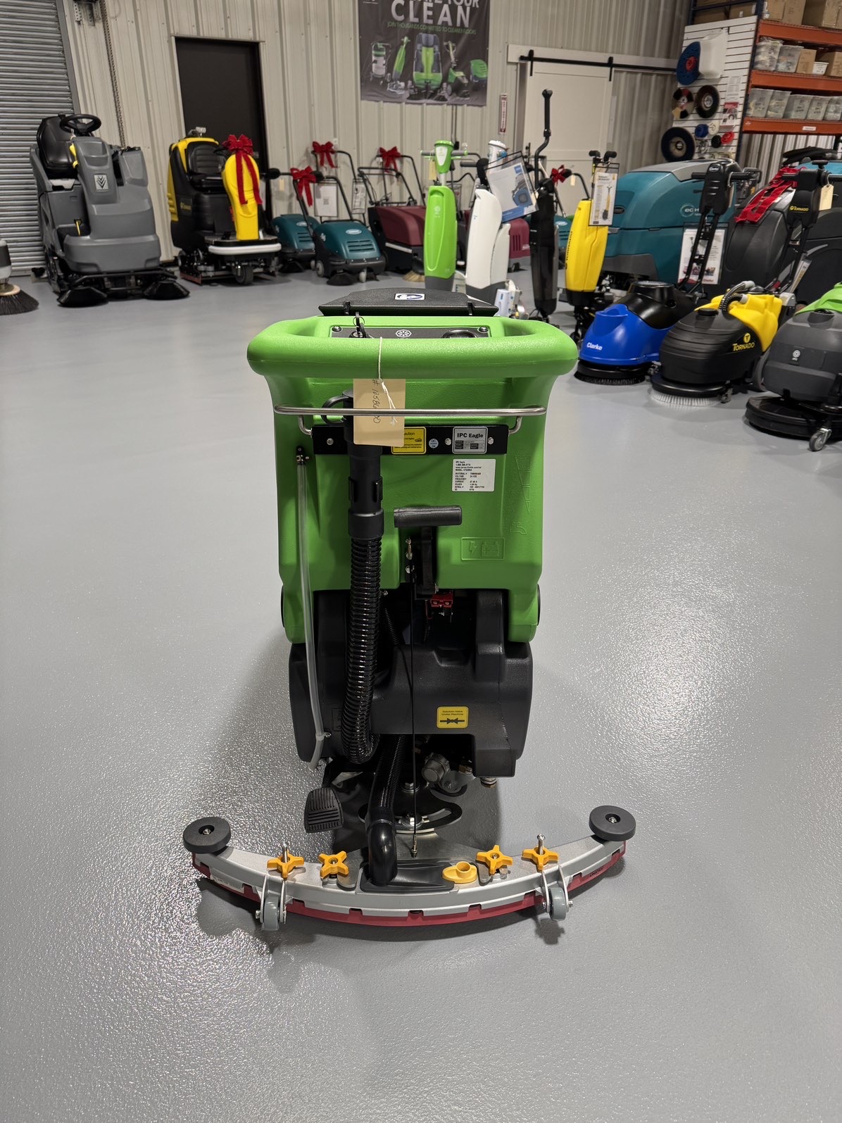 An IPC CT50 Walk-Behind Scrubber in a warehouse showroom at ChemSource Direct.