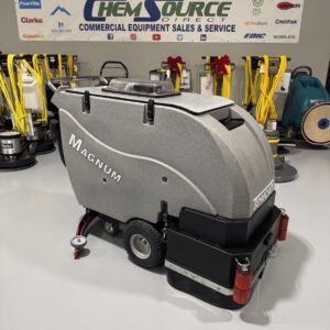 A Tomcat Magnum 26D Walk-Behind Scrubber in a warehouse showroom at ChemSource Direct.