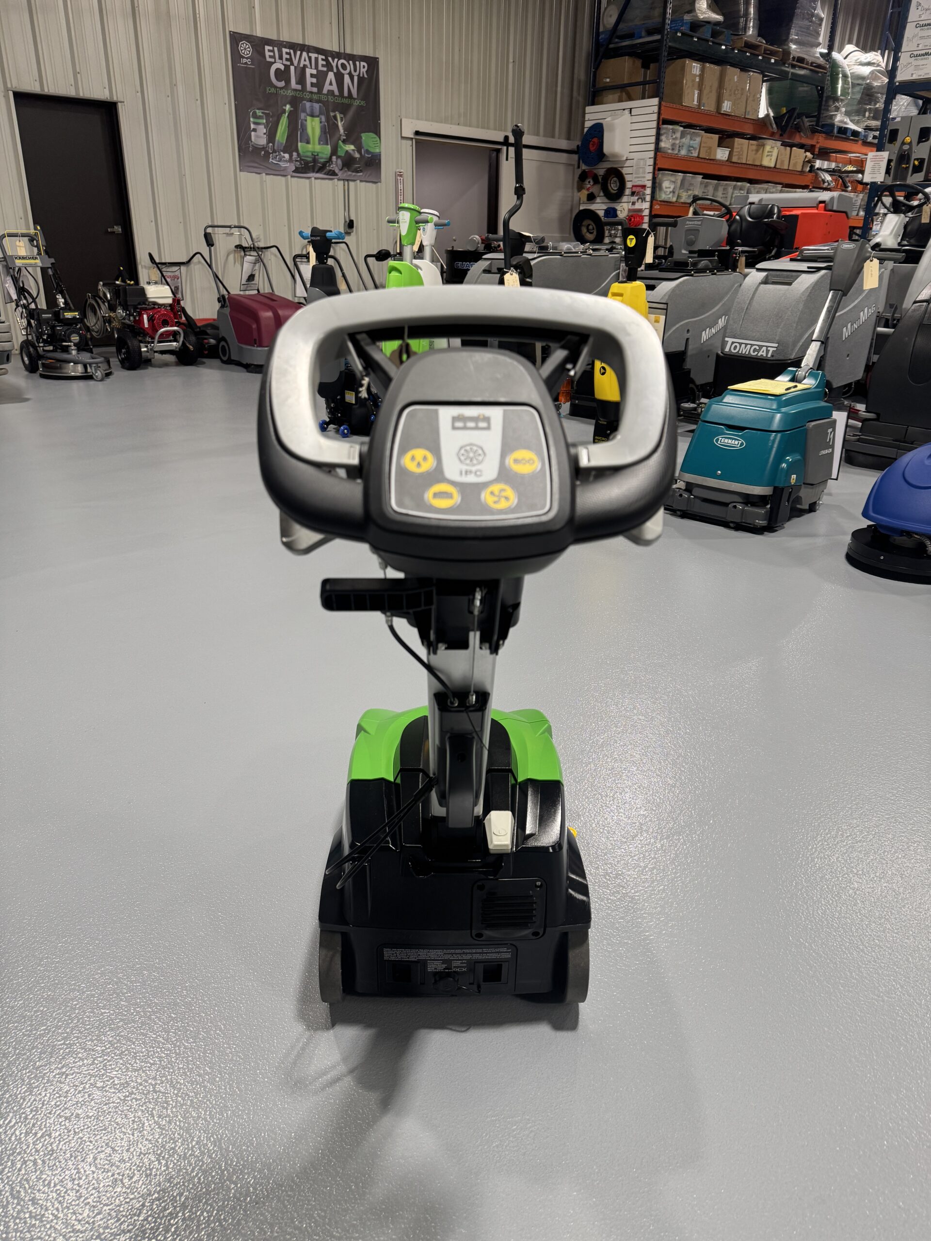 An IPC CT-5 Mini Floor Scrubber in a warehouse showroom at ChemSource Direct.
