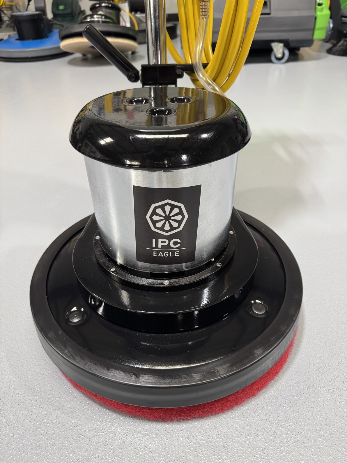 An IPC FM17 HD Low Speed Scrubber with Tank in a warehouse showroom at ChemSource Direct.