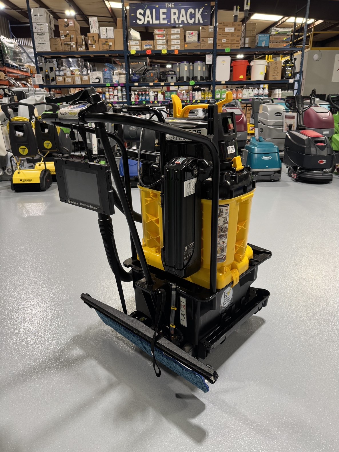 A Kaivac Battery Powered Auto Vac w/Kai Tutor in a warehouse showroom at ChemSource Direct.