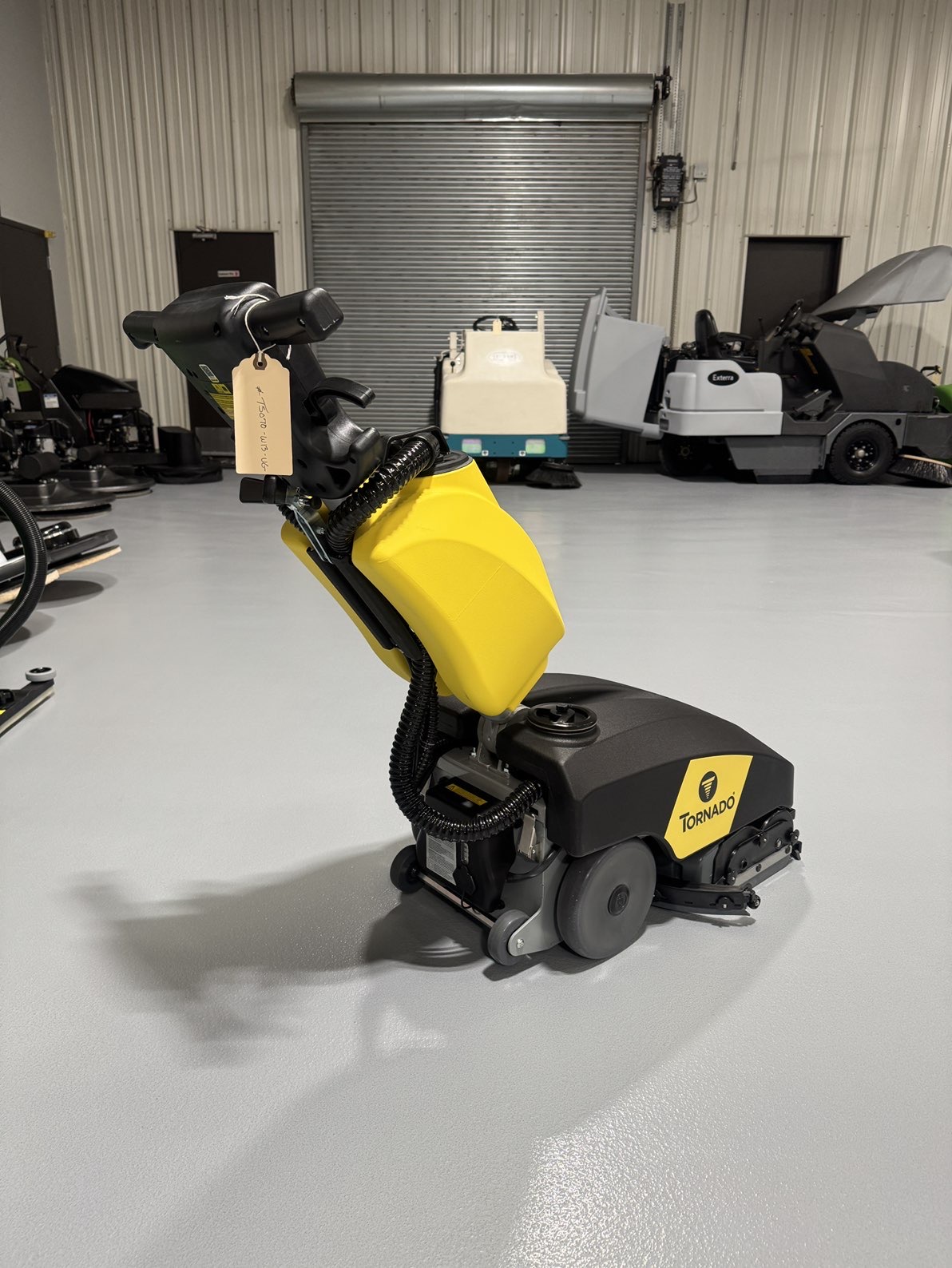 A Tornado BR 13/2 Cylindrical Scrubber in a warehouse showroom at ChemSource Direct.